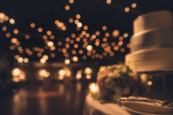 wedding cake and twinkly lights