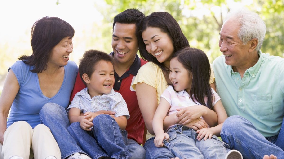 extended families sitting outdoors